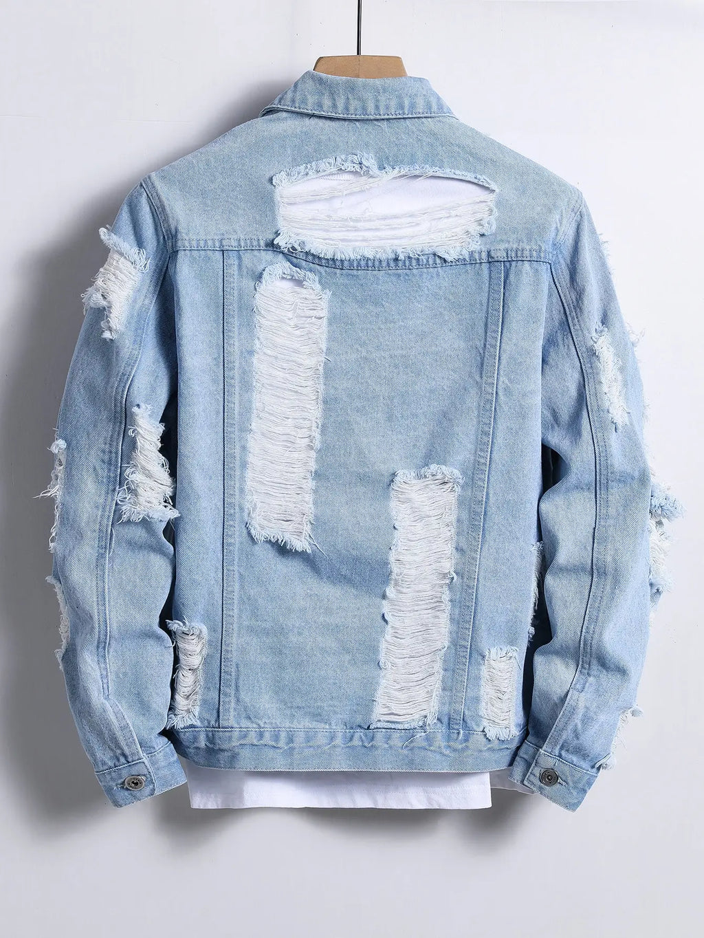 Light blue ripped denim jacket